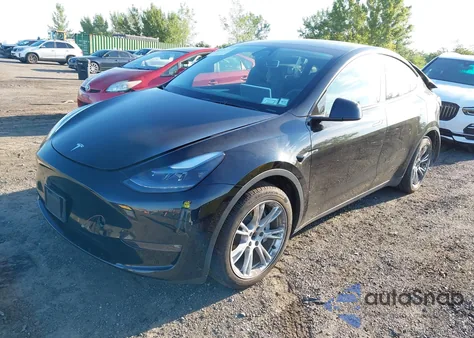 2023 Tesla Model Y Awd/Long Range Dual Motor All-Wheel Drive из США, поврежденный, VIN 7SAYGAEE1PF903829